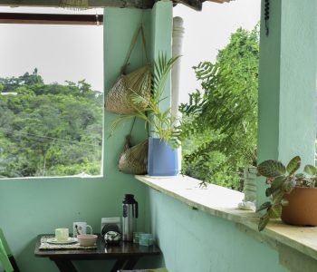 Varanda externa com vista para a serra